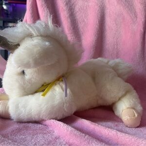 Vintage Aurora plush unicorn